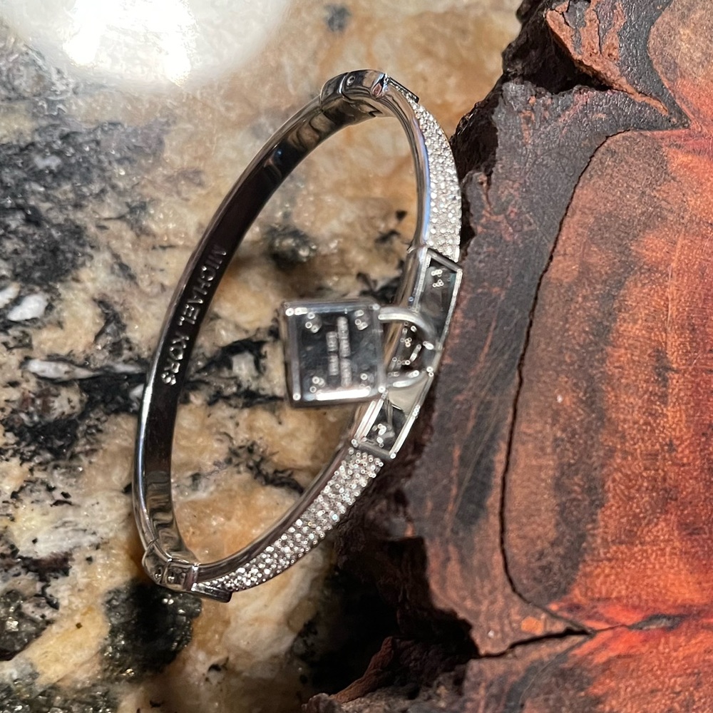 Original Michael Kors silver key lock bracelet. Slight wear